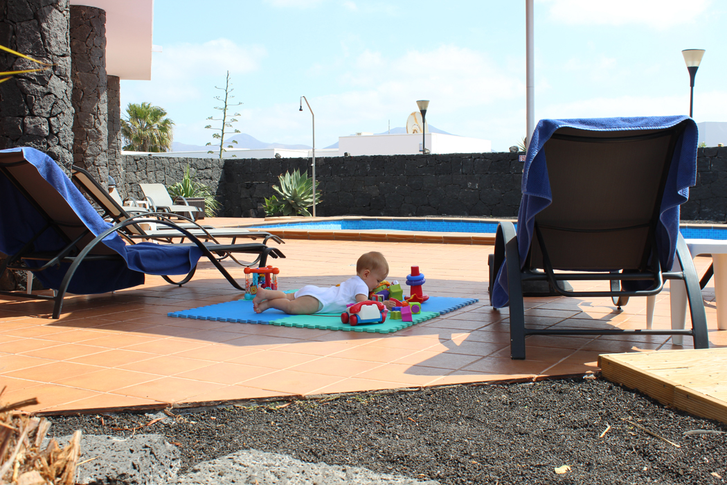 baby by pool